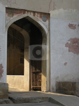 To use this stock image in your creative project, please select the size you need over to the right and click the "Add to Cart" button.
Your downloaded image will come with the Cutcaster watermark removed so don’t worry about the watermark you see on this page. Old Doorway stock photo, Evening light streaming through an old doorway by Colin Elves