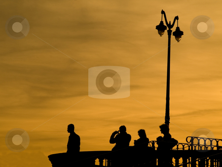 To use this stock image in your creative project, please select the size you need over to the right and click the "Add to Cart" button.
Your downloaded image will come with the Cutcaster watermark removed so don’t worry about the watermark you see on this page. Observation desk at twilight stock photo, Group of people at an observation desk at twilight by Laurent Dambies