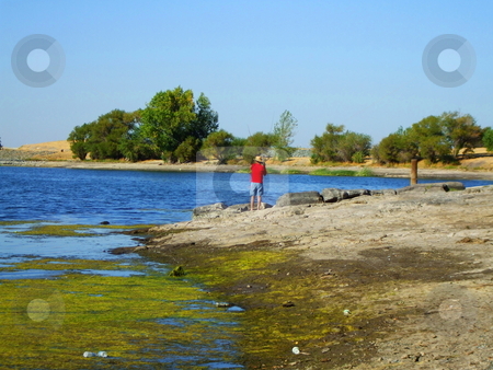 To use this stock image in your creative project, please select the size you need over to the right and click the "Add to Cart" button.
Your downloaded image will come with the Cutcaster watermark removed so don’t worry about the watermark you see on this page. Fisherman stock photo, by Michael Felix