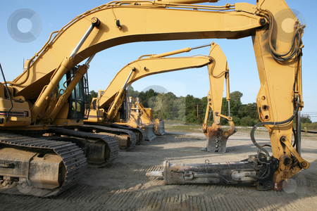 To use this stock image in your creative project, please select the size you need over to the right and click the "Add to Cart" button.
Your downloaded image will come with the Cutcaster watermark removed so don’t worry about the watermark you see on this page. Construction Lineup stock photo, Lineup of Construction Vehincles At Construction Site by Gregg Cerenzio