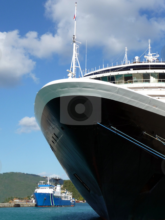 To use this stock image in your creative project, please select the size you need over to the right and click the "Add to Cart" button.
Your downloaded image will come with the Cutcaster watermark removed so don’t worry about the watermark you see on this page. Front of cruise ship at the dock stock photo, Perspective of the front of a large cruise ship at a dock by Jill Reid