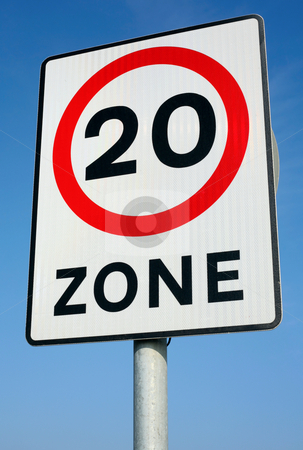 To use this stock image in your creative project, please select the size you need over to the right and click the "Add to Cart" button.
Your downloaded image will come with the Cutcaster watermark removed so don’t worry about the watermark you see on this page. British 20 miles an hour limit zone sign. stock photo, British 20 miles an hour limit zone sign. by Stephen Rees