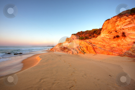 To use this stock image in your creative project, please select the size you need over to the right and click the "Add to Cart" button.
Your downloaded image will come with the Cutcaster watermark removed so don’t worry about the watermark you see on this page. Sunrise Rocks stock photo, Sunrise by the beach in Tathra, NSW by Christopher Meder