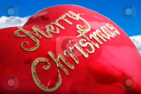 To use this stock image in your creative project, please select the size you need over to the right and click the "Add to Cart" button.
Your downloaded image will come with the Cutcaster watermark removed so don’t worry about the watermark you see on this page. Merry Christmas Heart stock photo, Merry Christmas in red heart shape ornament by Christopher Meder