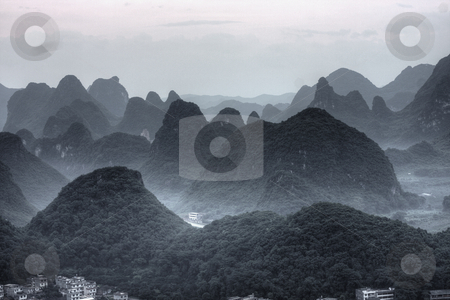 To use this stock image in your creative project, please select the size you need over to the right and click the "Add to Cart" button.
Your downloaded image will come with the Cutcaster watermark removed so don’t worry about the watermark you see on this page. Mountain landscape stock photo, Li river karst mountain landscape in Yangshuo, China by Christopher Meder