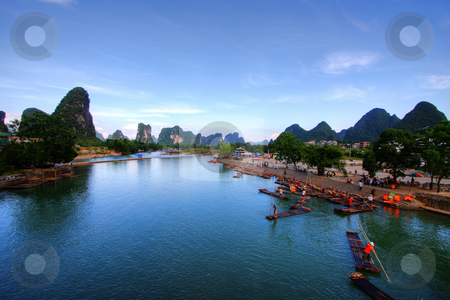 To use this stock image in your creative project, please select the size you need over to the right and click the "Add to Cart" button.
Your downloaded image will come with the Cutcaster watermark removed so don’t worry about the watermark you see on this page. Mountain landscape stock photo, Li river karst mountain landscape in Yangshuo, China by Christopher Meder