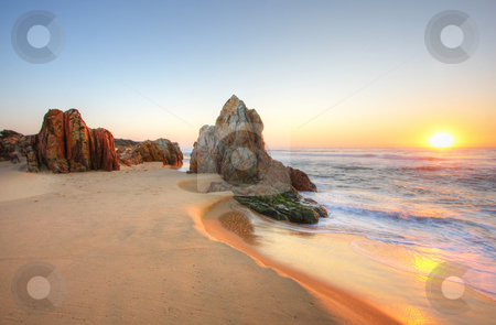 To use this stock image in your creative project, please select the size you need over to the right and click the "Add to Cart" button.
Your downloaded image will come with the Cutcaster watermark removed so don’t worry about the watermark you see on this page. Sunrise Rocks stock photo, Sunrise by the beach in Tathra, NSW by Christopher Meder