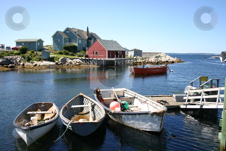 To use this stock image in your creative project, please select the size you need over to the right and click the "Add to Cart" button.
Your downloaded image will come with the Cutcaster watermark removed so don’t worry about the watermark you see on this page. Peggy's Cove, Nova Scotia stock photo, A view of the tiny historic village of Peggys Cove in Nova Scotia, Canada. This scenic coastal fishing village on is a popular tourist attraction due to the presence of it's famous lighthouse. by Alyce Taylor