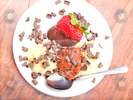 To use this stock image in your creative project, please select the size you need over to the right and click the "Add to Cart" button.
Your downloaded image will come with the Cutcaster watermark removed so don’t worry about the watermark you see on this page. Delicious icecream dessert on white plate stock photo, Delicious icecream dessert on white plate by Phillip Dyhr Hobbs