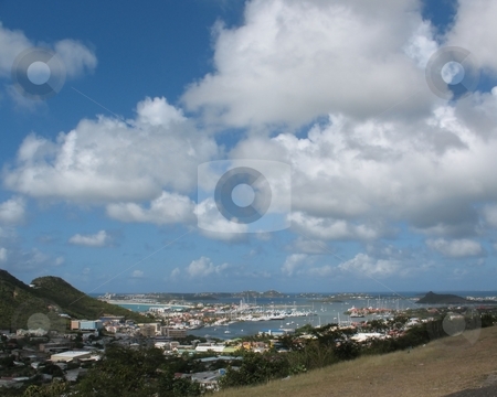 To use this stock image in your creative project, please select the size you need over to the right and click the "Add to Cart" button.
Your downloaded image will come with the Cutcaster watermark removed so don’t worry about the watermark you see on this page. A View of St. Maarten stock photo, A view of St. Maarten, from a hillside overlooking the city and the harbour. by Ray Carpenter