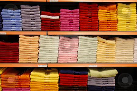 To use this stock image in your creative project, please select the size you need over to the right and click the "Add to Cart" button.
Your downloaded image will come with the Cutcaster watermark removed so don’t worry about the watermark you see on this page. Colorful towels stock photo, New colorful towels stacks on shelves in store by Julija Sapic