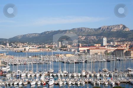 To use this stock image in your creative project, please select the size you need over to the right and click the "Add to Cart" button.
Your downloaded image will come with the Cutcaster watermark removed so don’t worry about the watermark you see on this page. Toulon Marina view stock photo, Toulon marina and mountains behind by Helen Shorey