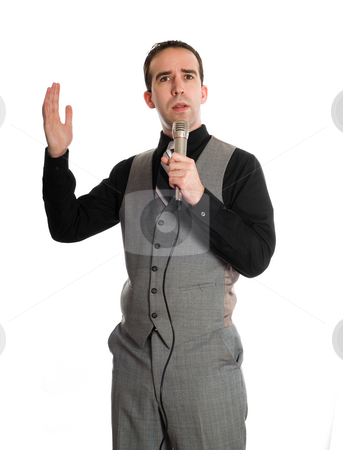 To use this stock image in your creative project, please select the size you need over to the right and click the "Add to Cart" button.
Your downloaded image will come with the Cutcaster watermark removed so don’t worry about the watermark you see on this page. Karaoke Singer stock photo, A young businessman having a good time and singing karaoke, isolated against a white background by Richard Nelson