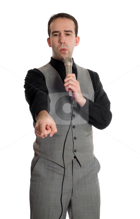 To use this stock image in your creative project, please select the size you need over to the right and click the "Add to Cart" button.
Your downloaded image will come with the Cutcaster watermark removed so don’t worry about the watermark you see on this page. Male Speaker stock photo, A young man wearing a grey suit is making a speech into the microphone, isolated against a white background by Richard Nelson