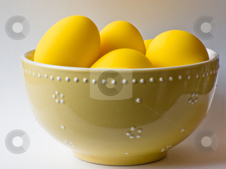 To use this stock image in your creative project, please select the size you need over to the right and click the "Add to Cart" button.
Your downloaded image will come with the Cutcaster watermark removed so don’t worry about the watermark you see on this page. Easter yellow eggs in a bowl stock photo, Fake yellow eggs in a bowl isolated on a white background. by FEL Yannick