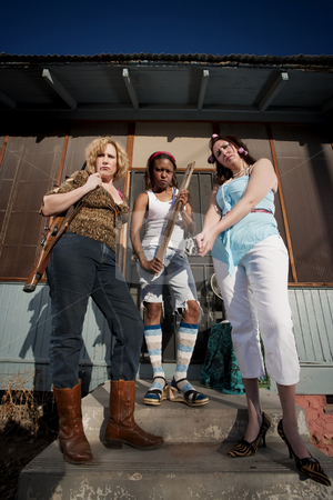 To use this stock image in your creative project, please select the size you need over to the right and click the "Add to Cart" button.
Your downloaded image will come with the Cutcaster watermark removed so don’t worry about the watermark you see on this page. Three rough women stock photo, Three rough women on a house step by Scott Griessel