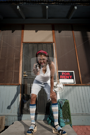 To use this stock image in your creative project, please select the size you need over to the right and click the "Add to Cart" button.
Your downloaded image will come with the Cutcaster watermark removed so don’t worry about the watermark you see on this page. Woman with Gun stock photo, African American woman with a gun on her front porch by Scott Griessel