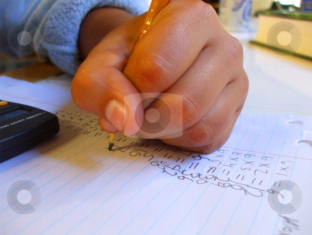 To use this stock image in your creative project, please select the size you need over to the right and click the "Add to Cart" button.
Your downloaded image will come with the Cutcaster watermark removed so don’t worry about the watermark you see on this page. Child Doing Homework stock photo, by Michael Felix