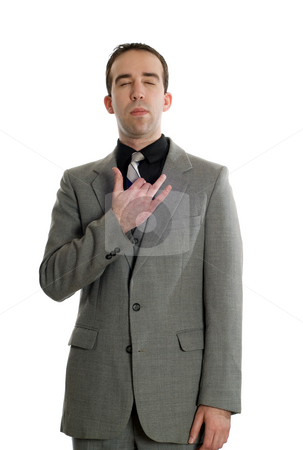To use this stock image in your creative project, please select the size you need over to the right and click the "Add to Cart" button.
Your downloaded image will come with the Cutcaster watermark removed so don’t worry about the watermark you see on this page. Emotional Freedom Technique stock photo, Front view of a businessman tapping his collar bone as a step in performing the Emotional Freedom Technique, isolated against a white background by Richard Nelson
