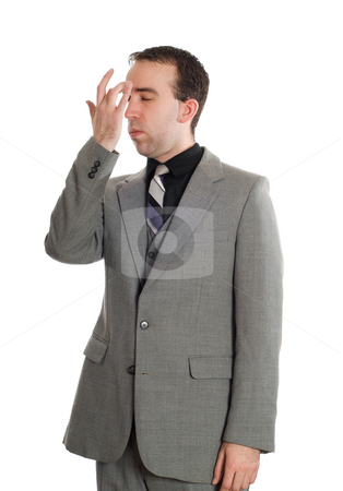 To use this stock image in your creative project, please select the size you need over to the right and click the "Add to Cart" button.
Your downloaded image will come with the Cutcaster watermark removed so don’t worry about the watermark you see on this page. Emotional Freedom Technique stock photo, A young businessman tapping his brow as one of steps in performing EFT, isolated against a white background by Richard Nelson