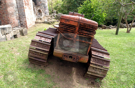 To use this stock image in your creative project, please select the size you need over to the right and click the "Add to Cart" button.
Your downloaded image will come with the Cutcaster watermark removed so don’t worry about the watermark you see on this page. Front of antique rusted farming tractor stock photo, Viewe of the front of an old antique rusted farming tractor by Jill Reid