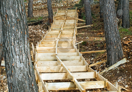 To use this stock image in your creative project, please select the size you need over to the right and click the "Add to Cart" button.
Your downloaded image will come with the Cutcaster watermark removed so don’t worry about the watermark you see on this page. Wooden stock photo, Wooden building construction through the forest. by Sinisa Botas