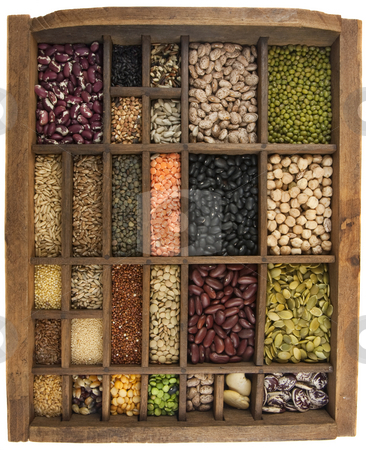 To use this stock image in your creative project, please select the size you need over to the right and click the "Add to Cart" button.
Your downloaded image will come with the Cutcaster watermark removed so don’t worry about the watermark you see on this page. Beans, grains, seeds in vintage typesetter box stock photo, Vintage, wooden typesetter case (drawer) with variety of beans, lentils, peas, grains and seeds isolated on white, white angle view by Marek Uliasz