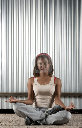 To use this stock image in your creative project, please select the size you need over to the right and click the "Add to Cart" button.
Your downloaded image will come with the Cutcaster watermark removed so don’t worry about the watermark you see on this page. African-American woman meditating stock photo, African-American woman meditating in front of corrugated metal by Scott Griessel