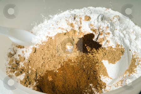 To use this stock image in your creative project, please select the size you need over to the right and click the "Add to Cart" button.
Your downloaded image will come with the Cutcaster watermark removed so don’t worry about the watermark you see on this page. Baking Mixture stock photo, A mixture of ingredients about to be sifted together in a mixing bowl by Richard Nelson