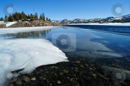 To use this stock image in your creative project, please select the size you need over to the right and click the "Add to Cart" button.
Your downloaded image will come with the Cutcaster watermark removed so don’t worry about the watermark you see on this page. Winter Lake stock photo, Snow covered shoreline on a sierra mountain lake, Loon lake, El Dorado Country, California by Lynn Bendickson