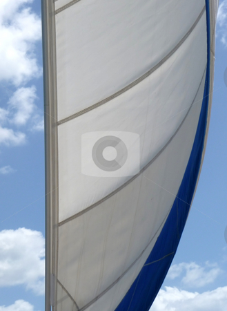 To use this stock image in your creative project, please select the size you need over to the right and click the "Add to Cart" button.
Your downloaded image will come with the Cutcaster watermark removed so don’t worry about the watermark you see on this page. Wind in the sail against a cloudy blue sky stock photo, Full mainsail against a cloudy bright blue sky by Jill Reid