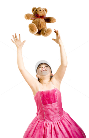 To use this stock image in your creative project, please select the size you need over to the right and click the "Add to Cart" button.
Your downloaded image will come with the Cutcaster watermark removed so don’t worry about the watermark you see on this page. Girl Having fun stock photo, Studio shot of endearing girl playing with teddy bear wearing fancy dress - Isolated on white by iodrakon