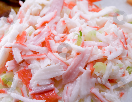 To use this stock image in your creative project, please select the size you need over to the right and click the "Add to Cart" button.
Your downloaded image will come with the Cutcaster watermark removed so don’t worry about the watermark you see on this page. Surimi Salad stock photo, Close up of Surimi (imitation crab) salad by iodrakon