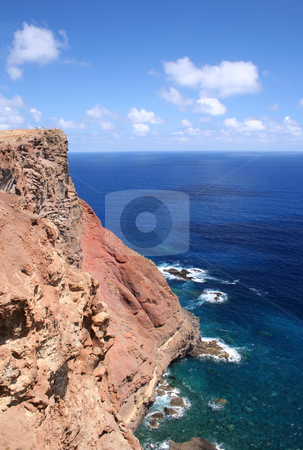 To use this stock image in your creative project, please select the size you need over to the right and click the "Add to Cart" button.
Your downloaded image will come with the Cutcaster watermark removed so don’t worry about the watermark you see on this page. Madeiran Cliffs stock photo, A view of the Atlantic taken from the miradoura (viewpoint) near Ponte de Castelo, Madeira. Shows the shadows and reflections of the clouds on the seas' surface. The few tourists at the top of the cliff show the scale of the cliff. by Helen Shorey