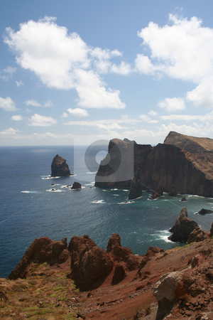 To use this stock image in your creative project, please select the size you need over to the right and click the "Add to Cart" button.
Your downloaded image will come with the Cutcaster watermark removed so don’t worry about the watermark you see on this page. Ponto de Castelo stock photo, Heading towards the eastern end of Madeira, there is a miradouro (lookout) point which shows the wild and rugged coastline. by Helen Shorey