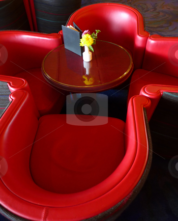 To use this stock image in your creative project, please select the size you need over to the right and click the "Add to Cart" button.
Your downloaded image will come with the Cutcaster watermark removed so don’t worry about the watermark you see on this page. Contemporary red leather chair stock photo, Contemporary red leatehr chairs around small round table by Jill Reid