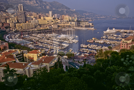 To use this stock image in your creative project, please select the size you need over to the right and click the "Add to Cart" button.
Your downloaded image will come with the Cutcaster watermark removed so don’t worry about the watermark you see on this page. Monte Carlo and the marina at Monaco stock photo, Monaco marina at La Condamine from Palace Plaza by GB Tittle