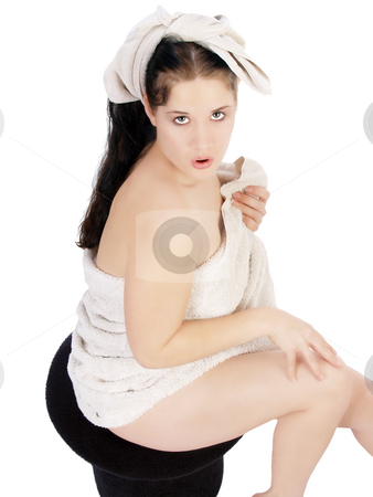 To use this stock image in your creative project, please select the size you need over to the right and click the "Add to Cart" button.
Your downloaded image will come with the Cutcaster watermark removed so don’t worry about the watermark you see on this page. Young caucasian woman sitting with towel pinup stock photo, Young woman sitting on black stool wrapped in white towel by Jeff Cleveland