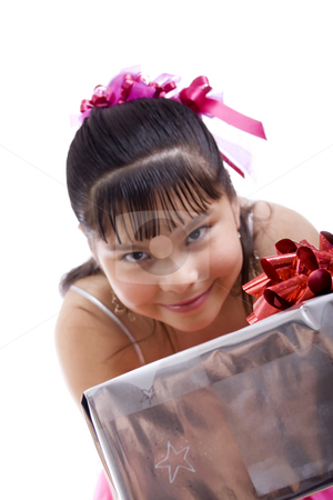 To use this stock image in your creative project, please select the size you need over to the right and click the "Add to Cart" button.
Your downloaded image will come with the Cutcaster watermark removed so don’t worry about the watermark you see on this page. I have a gift for you... stock photo, Studio shot of endearing girl with gift wearing fancy dress - focus on gift, Isolated on white by iodrakon