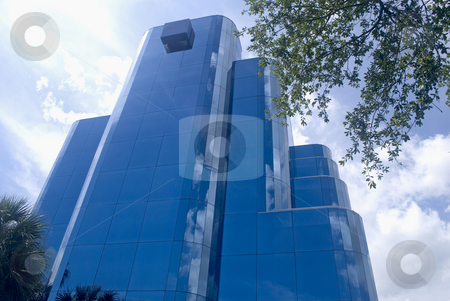 To use this stock image in your creative project, please select the size you need over to the right and click the "Add to Cart" button.
Your downloaded image will come with the Cutcaster watermark removed so don’t worry about the watermark you see on this page. Blue Building stock photo, Blue Building vertical perspective by Robert Cabrera