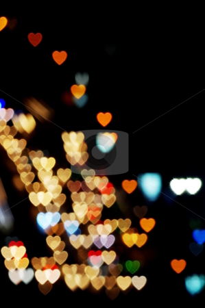 To use this stock image in your creative project, please select the size you need over to the right and click the "Add to Cart" button.
Your downloaded image will come with the Cutcaster watermark removed so don’t worry about the watermark you see on this page. Heart-shaped lights stock photo, Night lights blurred into heart-shaped bokeh by Martin Darley