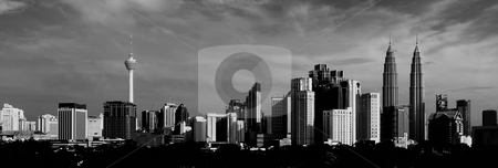 To use this stock image in your creative project, please select the size you need over to the right and click the "Add to Cart" button.
Your downloaded image will come with the Cutcaster watermark removed so don’t worry about the watermark you see on this page. Kuala Lumpur Cityscape stock photo, Kuala Lumpur Cityscape by Jaggat Images