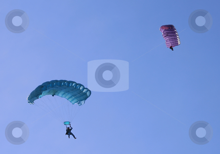 To use this stock image in your creative project, please select the size you need over to the right and click the "Add to Cart" button.
Your downloaded image will come with the Cutcaster watermark removed so don’t worry about the watermark you see on this page. Two parachutes stock photo, Two parachutes on a bright sunny day. by Ivan Paunovic