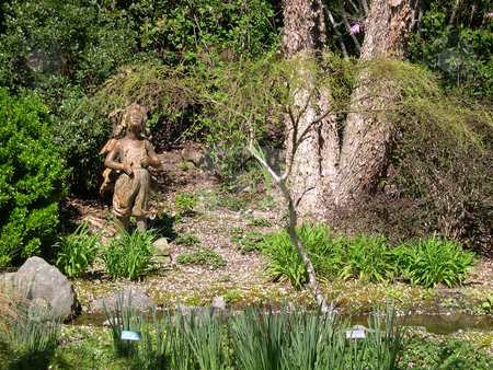 To use this stock image in your creative project, please select the size you need over to the right and click the "Add to Cart" button.
Your downloaded image will come with the Cutcaster watermark removed so don’t worry about the watermark you see on this page. Garden and statue in Sonoma stock photo, Garden and statue of girl in Sonoma California by Jaime Pharr