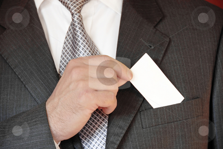 To use this stock image in your creative project, please select the size you need over to the right and click the "Add to Cart" button.
Your downloaded image will come with the Cutcaster watermark removed so don’t worry about the watermark you see on this page. Businessman with business card stock photo, Businessman hand holding a business card over suit pocket by Julija Sapic