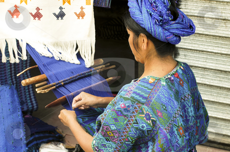 To use this stock image in your creative project, please select the size you need over to the right and click the "Add to Cart" button.
Your downloaded image will come with the Cutcaster watermark removed so don’t worry about the watermark you see on this page. Woman working hand loom stock photo, Lake Atitlan, Guatemala by Michael Cohen