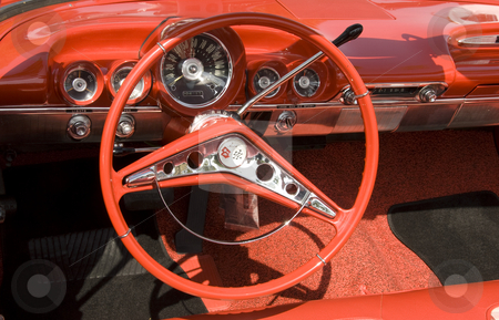 To use this stock image in your creative project, please select the size you need over to the right and click the "Add to Cart" button.
Your downloaded image will come with the Cutcaster watermark removed so don’t worry about the watermark you see on this page. Vintage Car Show stock photo, Wheel and other auto part at the mostly Chevy car show in Los Angeles, by Didier Tais