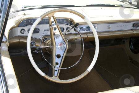 To use this stock image in your creative project, please select the size you need over to the right and click the "Add to Cart" button.
Your downloaded image will come with the Cutcaster watermark removed so don’t worry about the watermark you see on this page. Vintage Car Show stock photo, Wheel and other auto part at the mostly Chevy car show in Los Angeles, by Didier Tais