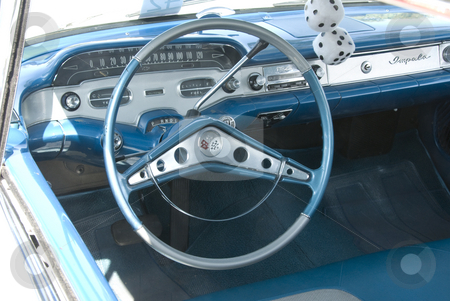 To use this stock image in your creative project, please select the size you need over to the right and click the "Add to Cart" button.
Your downloaded image will come with the Cutcaster watermark removed so don’t worry about the watermark you see on this page. Vintage Car Show stock photo, Wheel and other auto part at the mostly Chevy car show in Los Angeles, by Didier Tais
