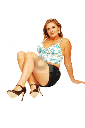 To use this stock image in your creative project, please select the size you need over to the right and click the "Add to Cart" button.
Your downloaded image will come with the Cutcaster watermark removed so don’t worry about the watermark you see on this page. Young woman sitting stock photo, An friendly blond girl in a blue and white top and short skirt sitting on the floor
for white background. by Horst Petzold